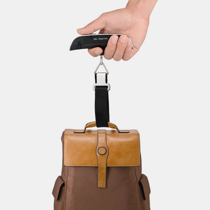 Portable luggage scale with tare function and overload indicator