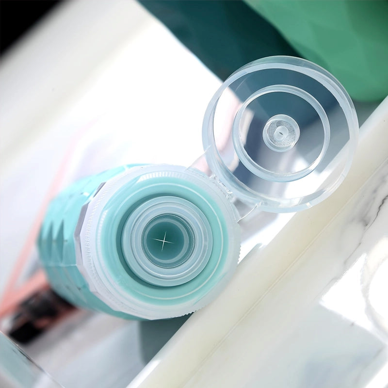Compact silicone travel bottles with leak-proof flip-top design